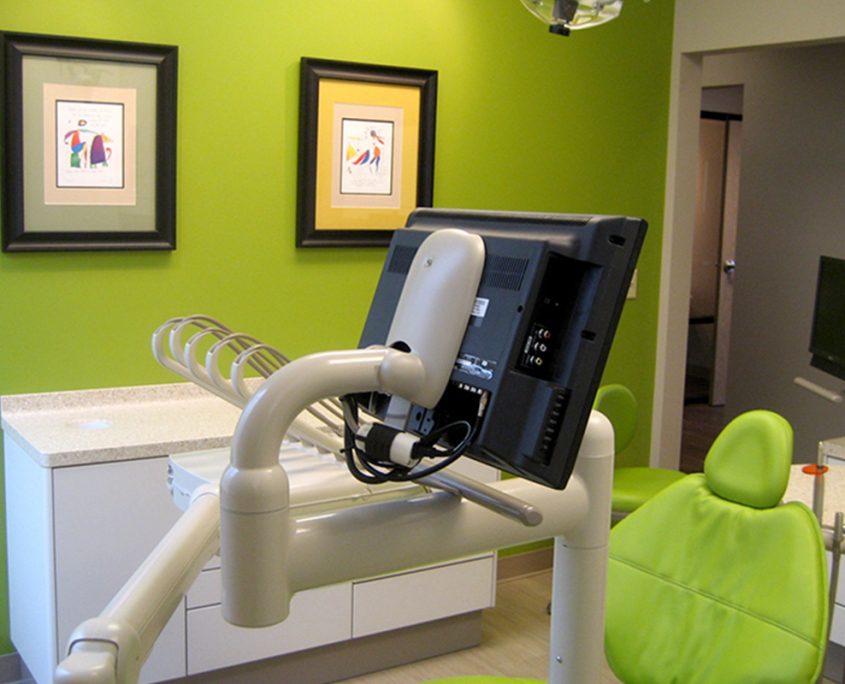 green wall paint in a room with medical requipment