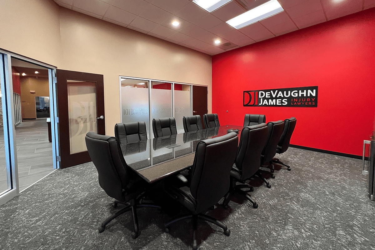 large conference room with red accent wall