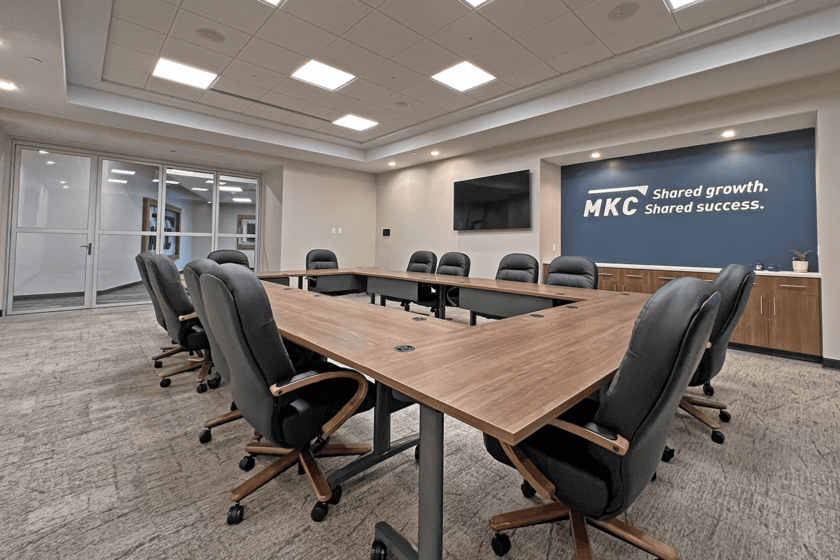 A large conference room with glass doors.